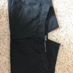 Black Tony Hawk shorts.